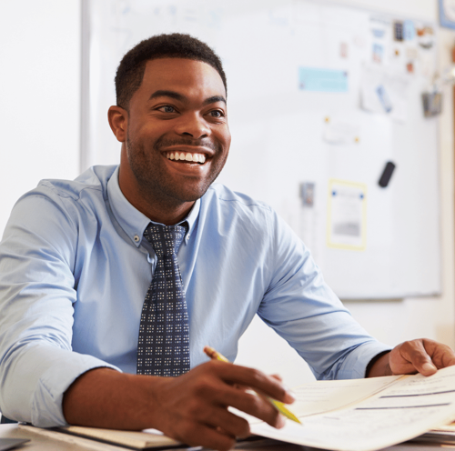 Male Teacher With Pen